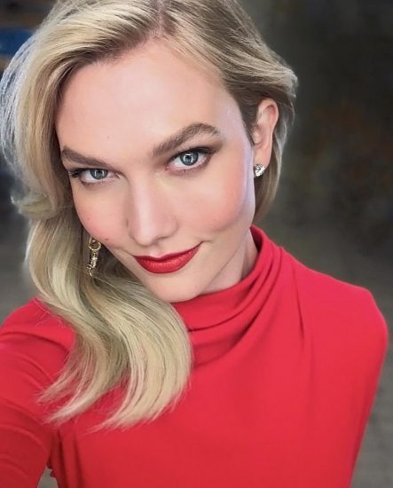 Karlie Kloss sexy in red blouse