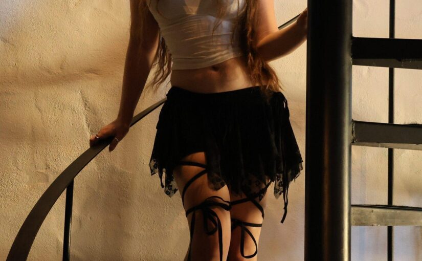 Isabella Ardley Poses in a Sheer Tank & Mini Skirt on Stairs (20 Photos)